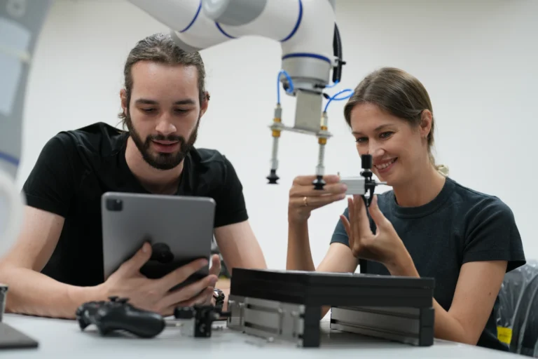 AME students using AI-powered diagnostic tools in a workshop