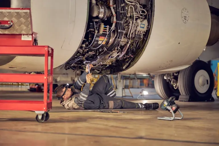 Aircraft Maintenance Engineer performing routine checks in the UAE