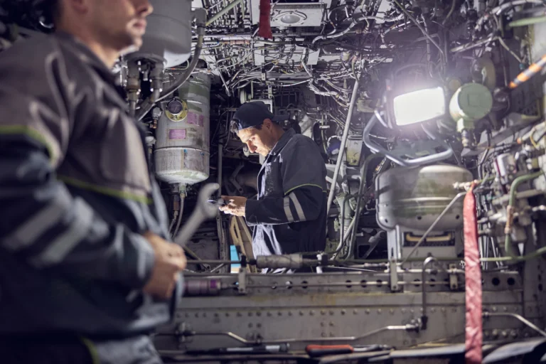 Practical training session in an aircraft maintenance workshop