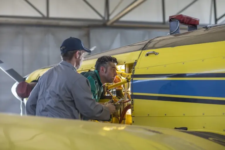 Student performing hands-on maintenance training at Sarsan Aviation Academy's simulation lab